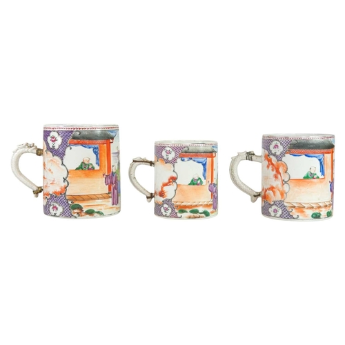 319 - A suite of three Chinese Mandarin pattern export mugs. Qianlong, each also painted with an iron red ... 