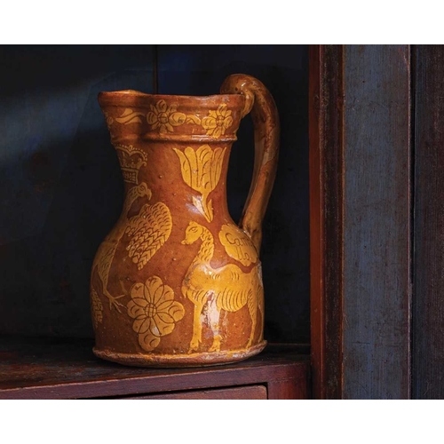 594 - A good North Devon slipware harvest jug, probably Barnstaple. Circa 1770, of unusual form, decorated... 