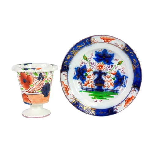 608 - A Swansea pearlware spill vase. Circa 1840, with a turnover rim, painted with a gaudy Welsh design, ... 
