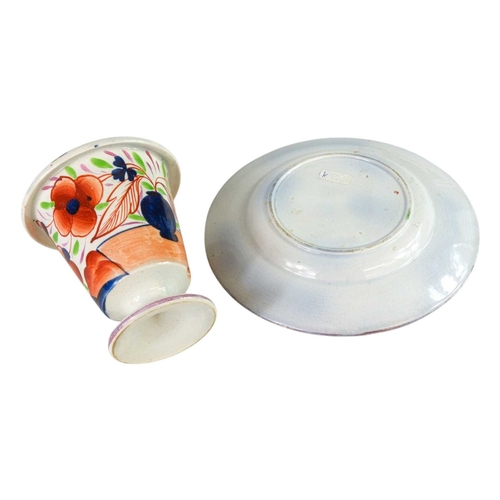 608 - A Swansea pearlware spill vase. Circa 1840, with a turnover rim, painted with a gaudy Welsh design, ... 