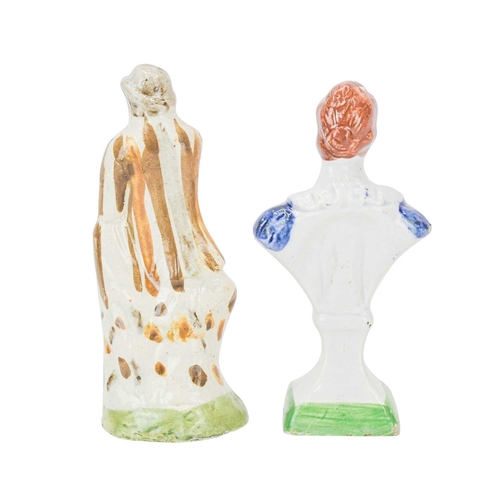 609 - A pearlware slip moulded figure of a man holding a bag. Circa 1820, painted in Pratt colours of ochr... 