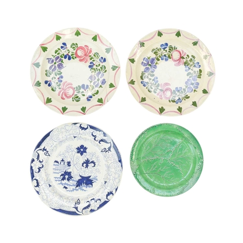 624 - Four Welsh pottery plates. A Swansea, circa 1800, cabbage leaf moulded green glaze plate, diameter 2... 