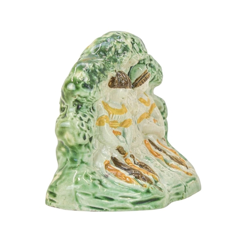 628 - A Staffordshire Pratt ware figure group of the babes in the wood. Circa 1820, with ochre, brown and ... 