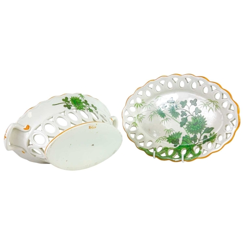 630 - A pearlware reticulated basket and stand. Possibly Spode, circa 1810, overpainted with floral design... 