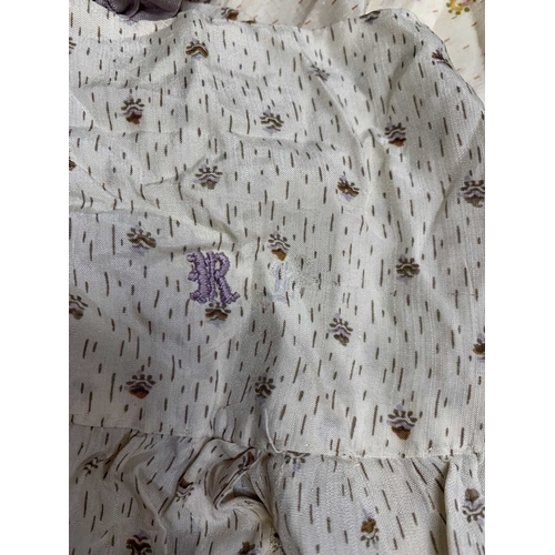 644 - Two pairs of patterned silk bloomers. Or open drawers, with ribbon and lace detailing, one pair is i... 