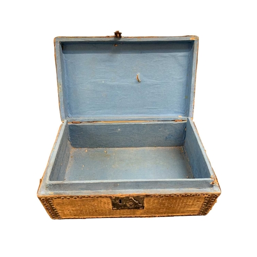 713 - A hide and studded leather covered document box. 18th century, with an applied brass label inscribed... 