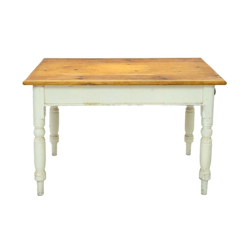 714 - A late Victorian pine kitchen table. The painted base fitted an end drawer and raised on turned legs... 