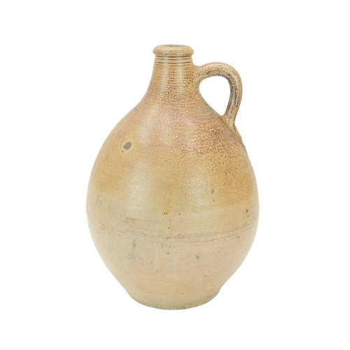 718 - An 18th century salt glazed stoneware jar. Possibly London, with a grooved handle, height 41cm.