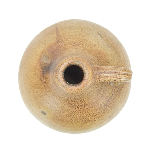 718 - An 18th century salt glazed stoneware jar. Possibly London, with a grooved handle, height 41cm.