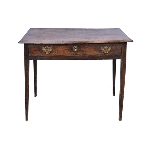 744 - A George III oak side table. Fitted a long drawer and raised on square taper legs, height 72cm, widt... 