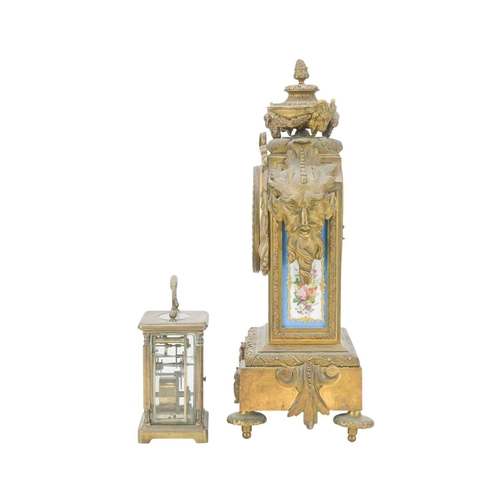 765 - A 19th century French mantel clock The gilt brass case with Sevres style painted porcelain panels fl... 