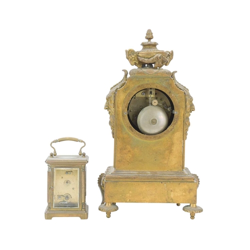 765 - A 19th century French mantel clock The gilt brass case with Sevres style painted porcelain panels fl... 