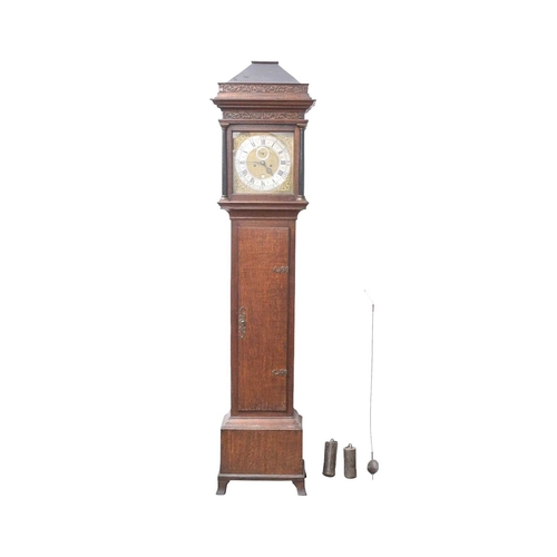 769 - An eight-day oak longcase clock by Jer Berry N Petherton. With a blind fret carved caddy top, the 30... 