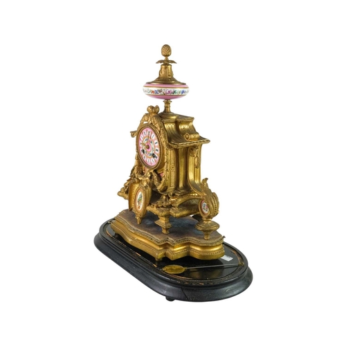 772 - A French 19th century gilt metal and porcelain mantel clock. The movement stamped Brevette and C.J. ... 