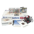 A Commodore 64 computer. In original box, including the user manual ...