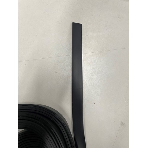 155 - 25M OF 18MM X 3MM BLACK PVC TACKING STRIP