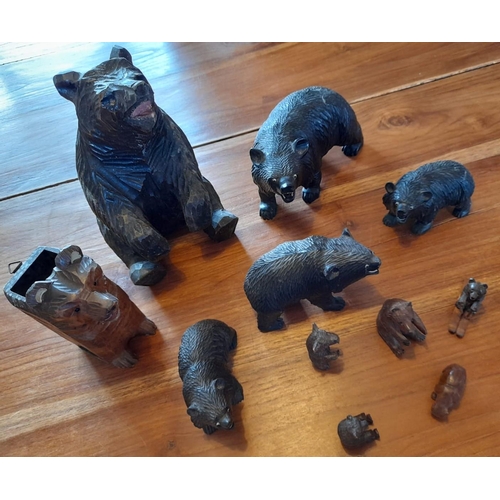 3 - Eleven Wooden Carved Brown / Black Forest Bears. A combination of large and small.