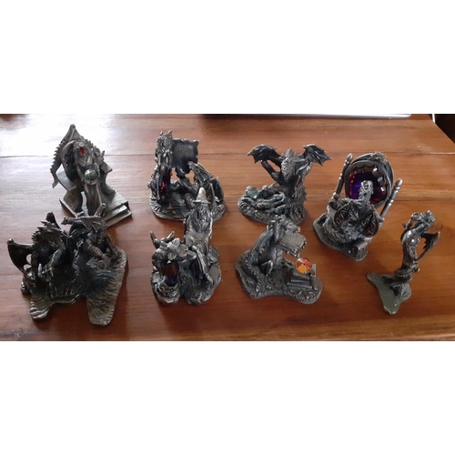 34 - Eight Pewter Dragon Crystal Collectables