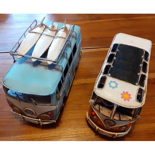 107 - Two VW Camper Van Toy Vans. Largest measures 25cm long.