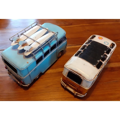 107 - Two VW Camper Van Toy Vans. Largest measures 25cm long.