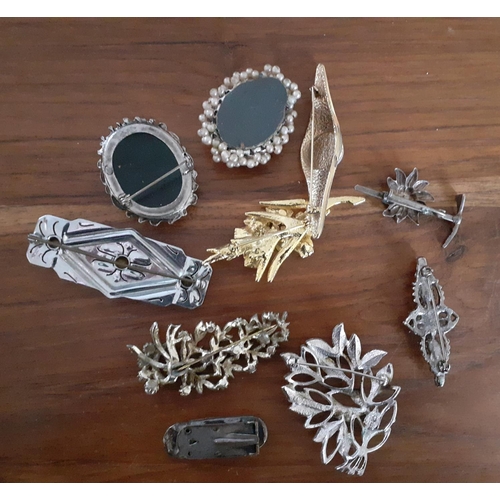 335 - Ten Decorative Pin Brooches