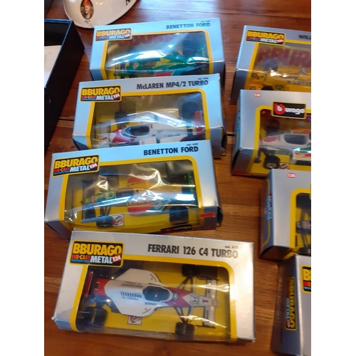 128 - Ten BBURAGO Boxed Model Die Cast Cars. Size 1/24