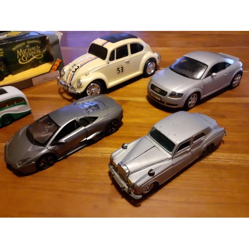 130 - 6 Large Die Cast Vehicles
Beetle 26cm Long, Audi 22cm Long, Lambo 19cm, Rolls Royce 18cm, Bus 16cm a... 