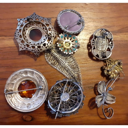 339 - Selection of Nine Costume Brooches