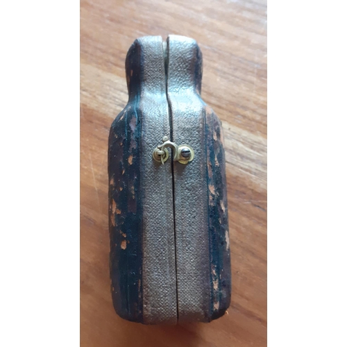 32 - Vintage Ladies Perfume Bottle in Leather Supporting case. Bottle has stopper and lid. Measures 9cm t... 
