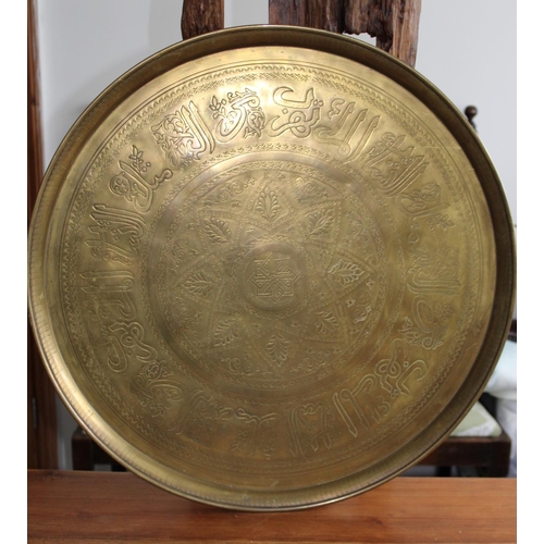 47 - Large Brass Decorative Tray / Wall Plaque

Measures 56cm Diameter