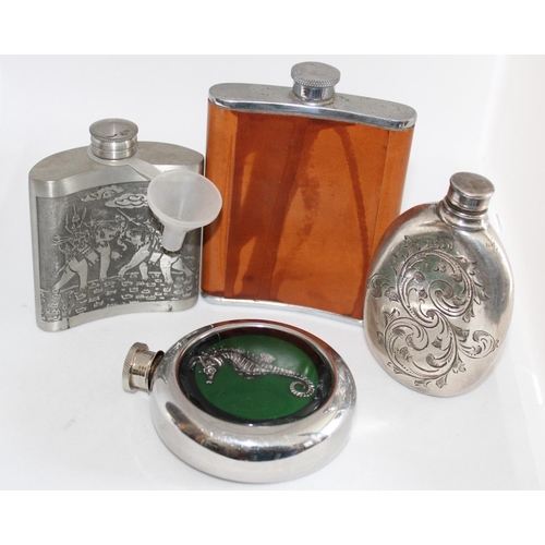 44 - Four Different Gents Hip Flasks