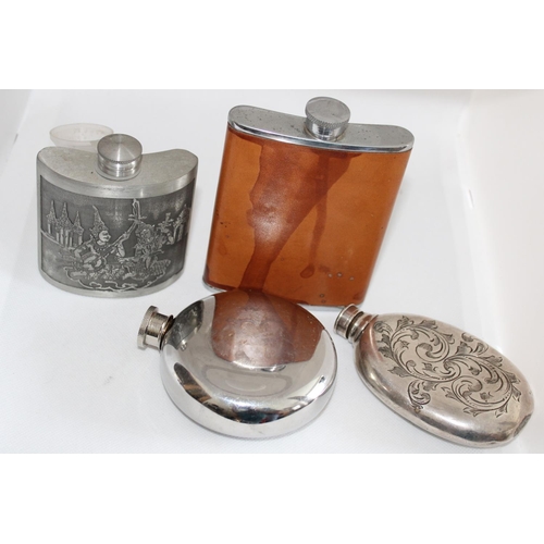 44 - Four Different Gents Hip Flasks