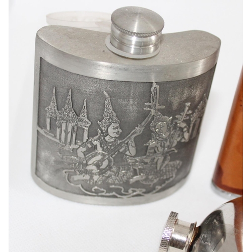 44 - Four Different Gents Hip Flasks