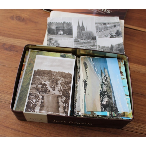10 - Collection of Worldwide Postcards in Tin