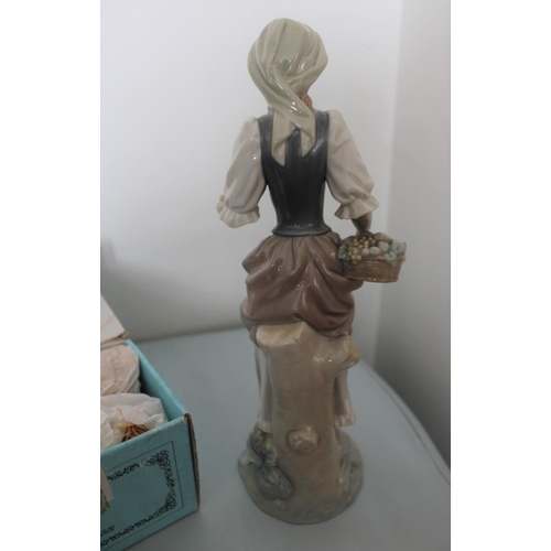 26 - Two Lladro Figurines. Smallest is Sleeping Boy in Original Box. Other is lady figurine measuring 30c... 