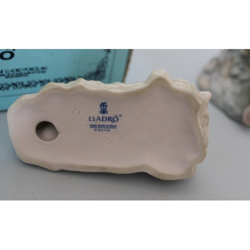 26 - Two Lladro Figurines. Smallest is Sleeping Boy in Original Box. Other is lady figurine measuring 30c... 