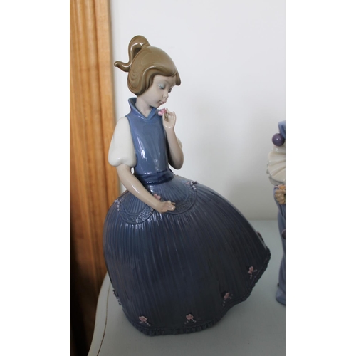 27 - Three Ceramic Figurines. One made by Lladro, One Nao and one from The Regal Collection. Tallest (Lla... 