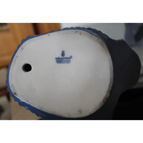 27 - Three Ceramic Figurines. One made by Lladro, One Nao and one from The Regal Collection. Tallest (Lla... 