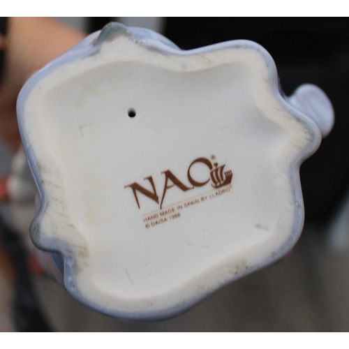 27 - Three Ceramic Figurines. One made by Lladro, One Nao and one from The Regal Collection. Tallest (Lla... 