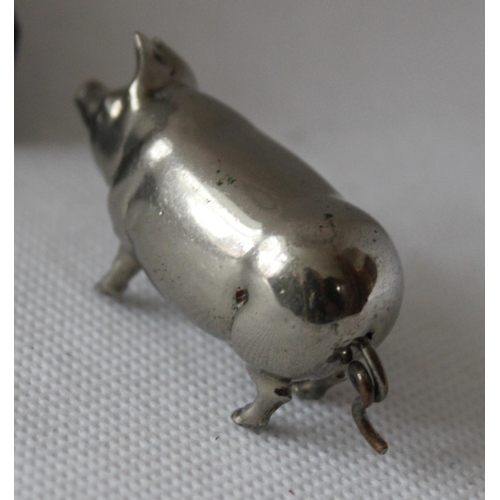 41 - Vintage Silver Pig with Tape Measure - Pig measures 5cm in length ( possibly silver)

Tape is delica... 