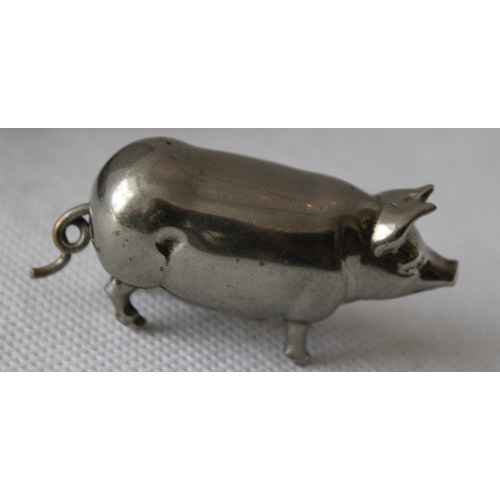 41 - Vintage Silver Pig with Tape Measure - Pig measures 5cm in length ( possibly silver)

Tape is delica... 