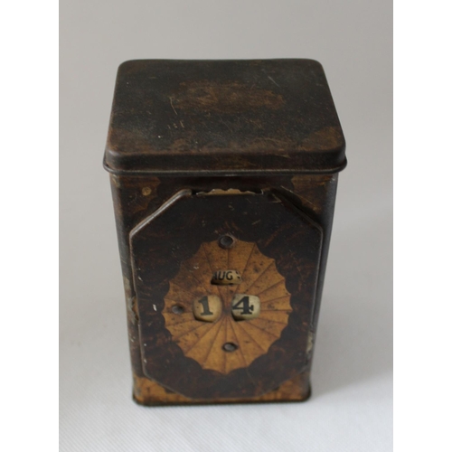 44 - Vintage Tea Caddy with Calendar Wheel on Front. Stands 13cm tall by 7.5cm wide approx