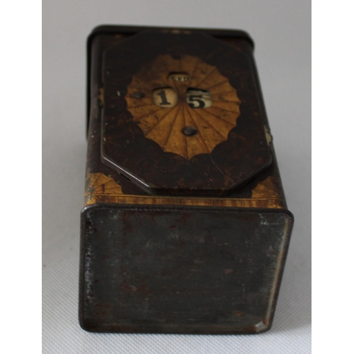 44 - Vintage Tea Caddy with Calendar Wheel on Front. Stands 13cm tall by 7.5cm wide approx