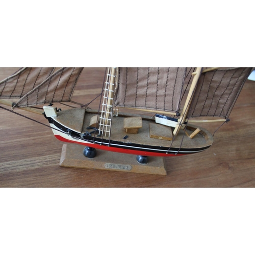 57 - Two Colllectable Wooden Boats on Plinths