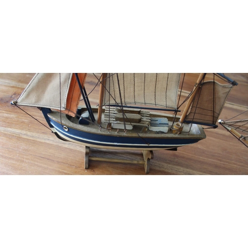 57 - Two Colllectable Wooden Boats on Plinths