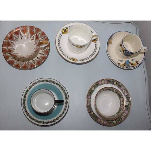 24 - Five Collectable Decorative Mini Cups & Saucers