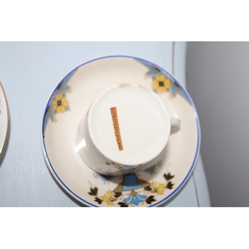 24 - Five Collectable Decorative Mini Cups & Saucers