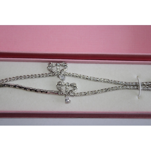 244 - 2 x White Metal CZ Bracelets