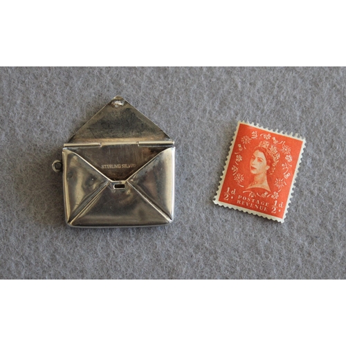 535 - Stamped Sterling Silver Pendant Envelope/Stamp Holder
Length-3cm
Engraved-D.A.C 1920