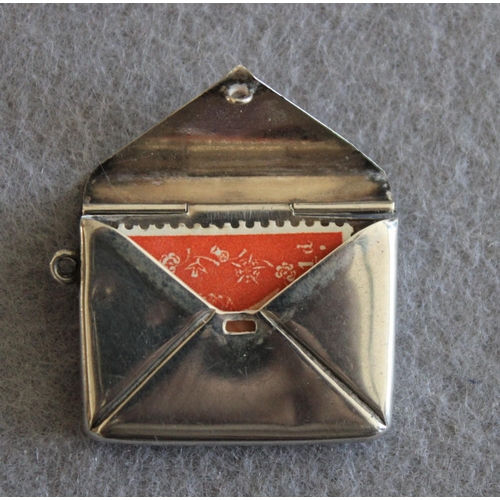 535 - Stamped Sterling Silver Pendant Envelope/Stamp Holder
Length-3cm
Engraved-D.A.C 1920